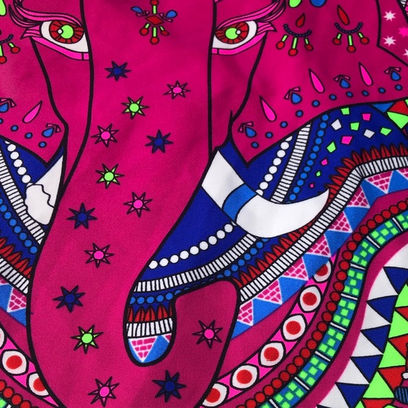 Mara Hoffman rash guard with pink ganesh against a pool blue background - Picture 14 of 14